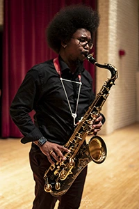 Dr. Rafael Powell II performing on saxophone